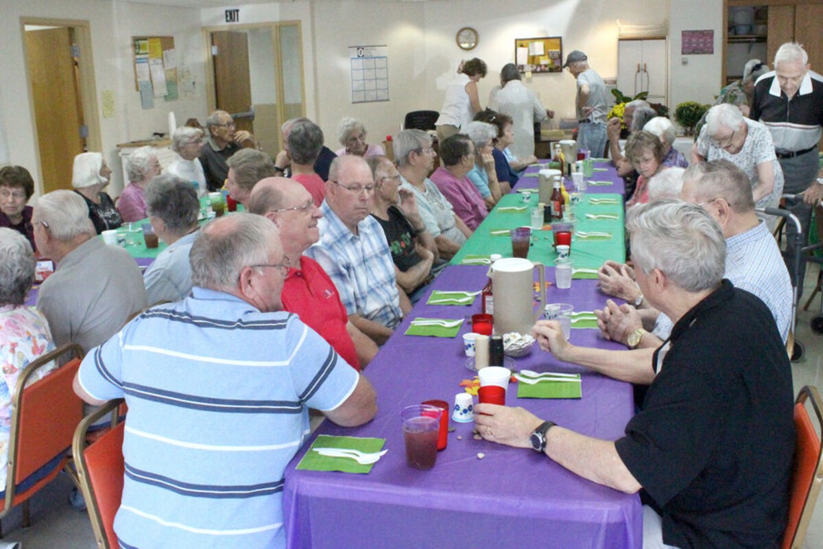 Seniors sharing a congregate meal at The Center